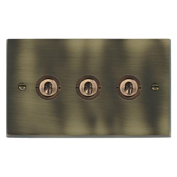 Cheriton Victorian Antique Brass 3 gang 20AX 2 Way Toggle Antique Brass