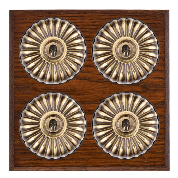 Bloomsbury Chamfered Antique Mahogany 4 gang 20AX 2 Way Toggle Antique Brass Fluted Dome/Black Collar