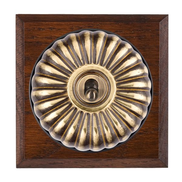 Bloomsbury Chamfered Antique Mahogany 1 gang 20AX Intermediate Toggle Antique Brass Fluted Dome/Black Collar