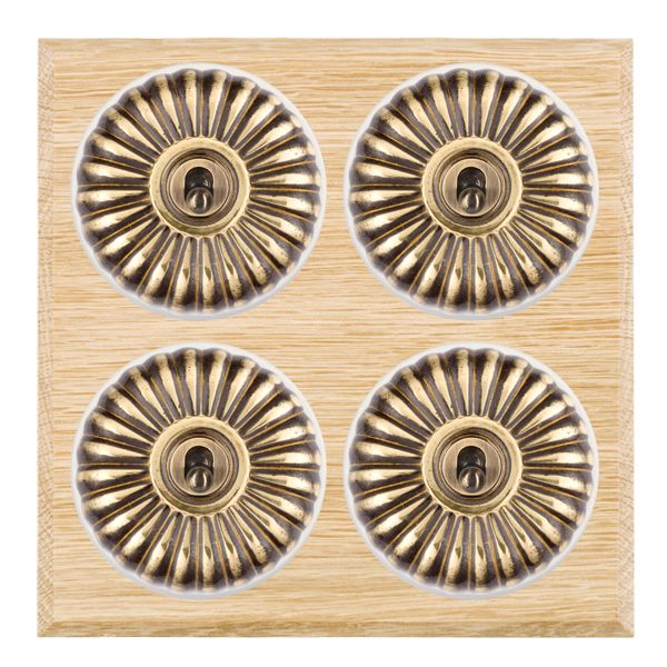 Bloomsbury Chamfered Light Oak 4 gang 20AX 2 Way Toggle Antique Brass Fluted Dome/White Collar