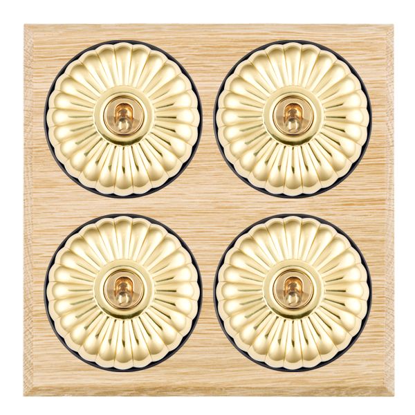 Bloomsbury Chamfered Light Oak 4 gang 20AX 2 Way Toggle Polished Brass Fluted Dome/Black Collar