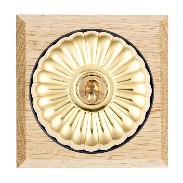 Bloomsbury Chamfered Light Oak 1 gang 20AX Double Pole Toggle Polished Brass Fluted Dome/Black Collar