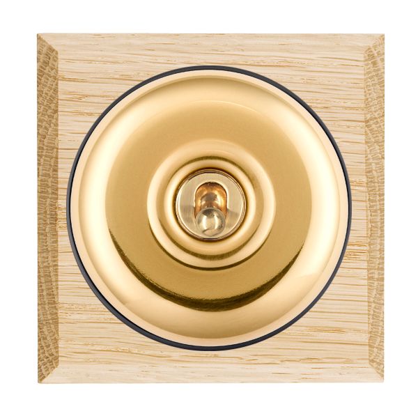 Bloomsbury Chamfered Light Oak 1 gang 20AX Double Pole Toggle Polished Brass Plain Dome/Black Collar