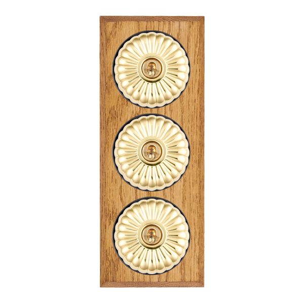 Bloomsbury Chamfered Medium Oak 3 gang 20AX 2 Way Toggle Polished Brass Fluted Dome/Black Collar