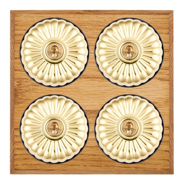 Bloomsbury Chamfered Medium Oak 4 gang 20AX 2 Way Toggle Polished Brass Fluted Dome/Black Collar