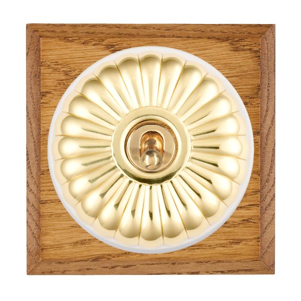 Bloomsbury Chamfered Medium Oak 1 gang 20AX Intermediate Toggle Polished Brass Fluted Dome/White Collar