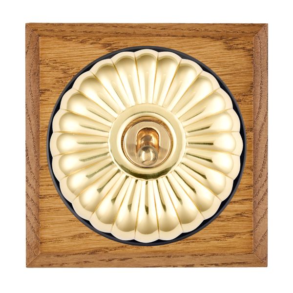 Bloomsbury Chamfered Medium Oak 1 gang 20AX Double Pole Toggle Polished Brass Fluted Dome/Black Collar