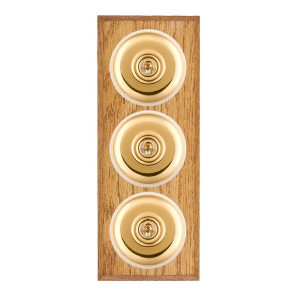 Bloomsbury Chamfered Medium Oak 3 gang 20AX 2 Way Toggle Polished Brass Plain Dome/White Collar