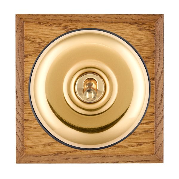 Bloomsbury Chamfered Medium Oak 1 gang 20AX Double Pole Toggle Polished Brass Plain Dome/Black Collar