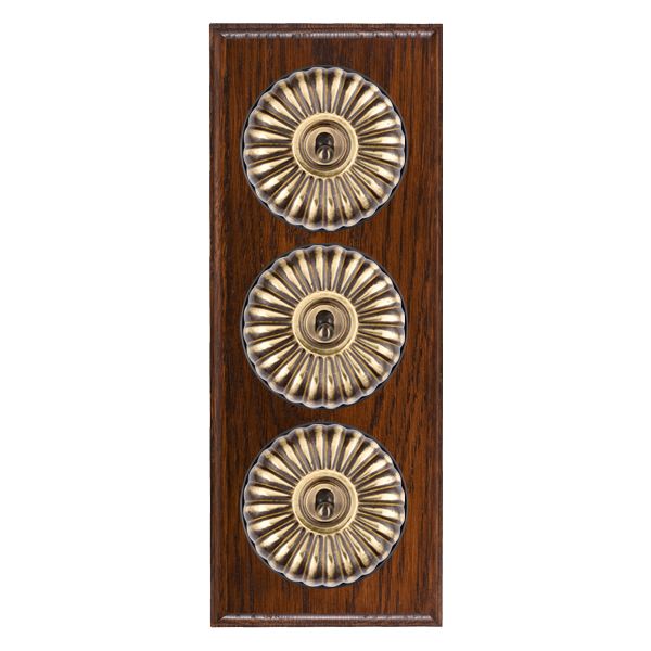 Bloomsbury Ovolo Antique Mahogany 3 gang 20AX 2 Way Toggle Antique Brass Fluted Dome/Black Collar