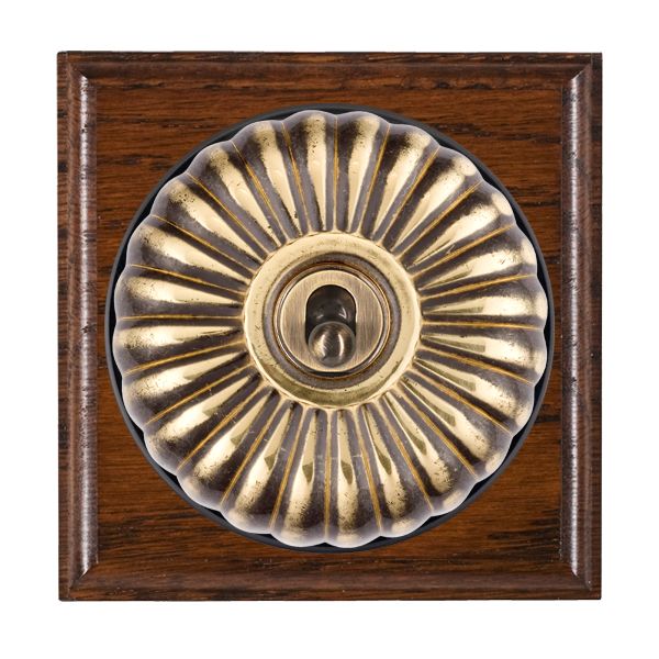 Bloomsbury Ovolo Antique Mahogany 1 gang 20AX Intermediate Toggle Antique Brass Fluted Dome/Black Collar