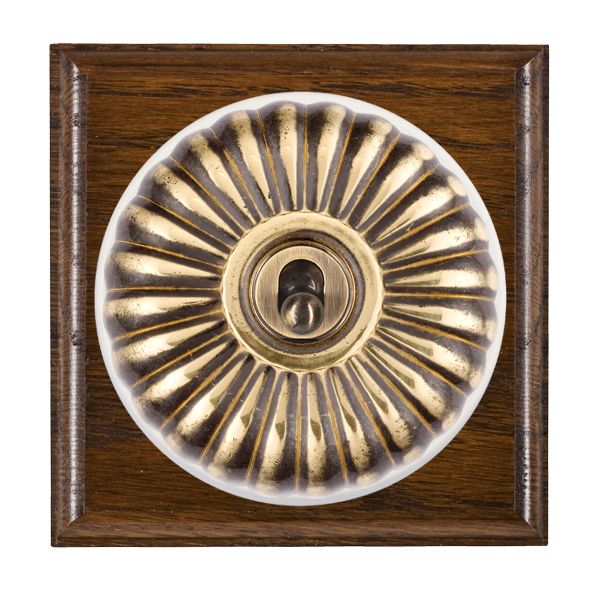 Bloomsbury Ovolo Dark Oak 1 gang 20AX 2 Way Toggle Antique Brass Fluted Dome/White Collar