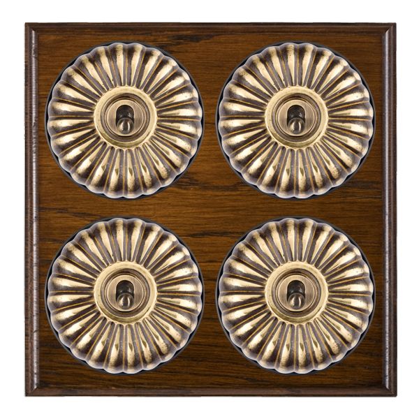 Bloomsbury Ovolo Dark Oak 4 gang 20AX 2 Way Toggle Antique Brass Fluted Dome/Black Collar
