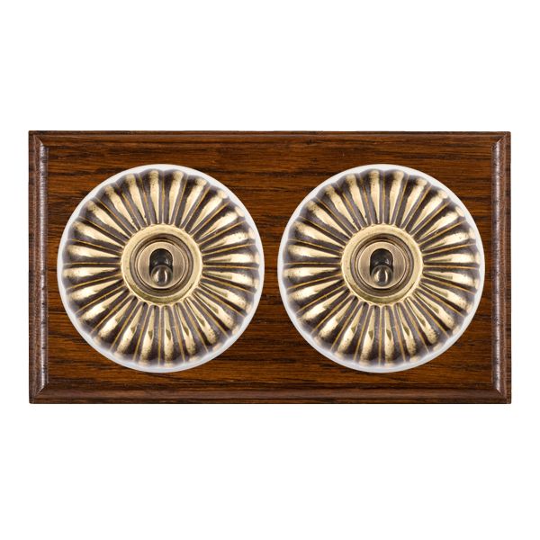 Bloomsbury Ovolo Dark Oak 2 gang 20AX Intermediate Toggle Antique Brass Fluted Dome/White Collar