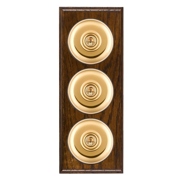 Bloomsbury Ovolo Dark Oak 3 gang 20AX 2 Way Toggle Polished Brass Plain Dome/Black Collar