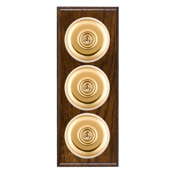 Bloomsbury Ovolo Dark Oak 3 gang 20AX 2 Way Toggle Polished Brass Plain Dome/White Collar