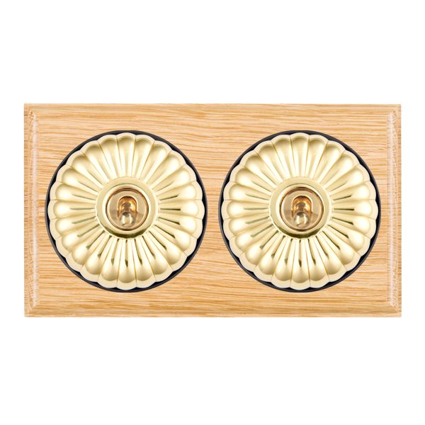 Bloomsbury Ovolo Light Oak 2 gang 20AX 2 Way Toggle Polished Brass Fluted Dome/Black Collar