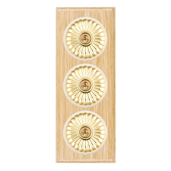 Bloomsbury Ovolo Light Oak 3 gang 20AX 2 Way Toggle Polished Brass Fluted Dome/White Collar