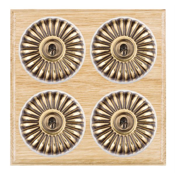 Bloomsbury Ovolo Light Oak 4 gang 20AX 2 Way Toggle Antique Brass Fluted Dome/White Collar