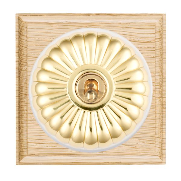Bloomsbury Ovolo Light Oak 1 gang 20AX Intermediate Toggle Polished Brass Fluted Dome/White Collar