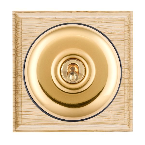 Bloomsbury Ovolo Light Oak 1 gang 20AX 2 Way Toggle Polished Brass Plain Dome/Black Collar