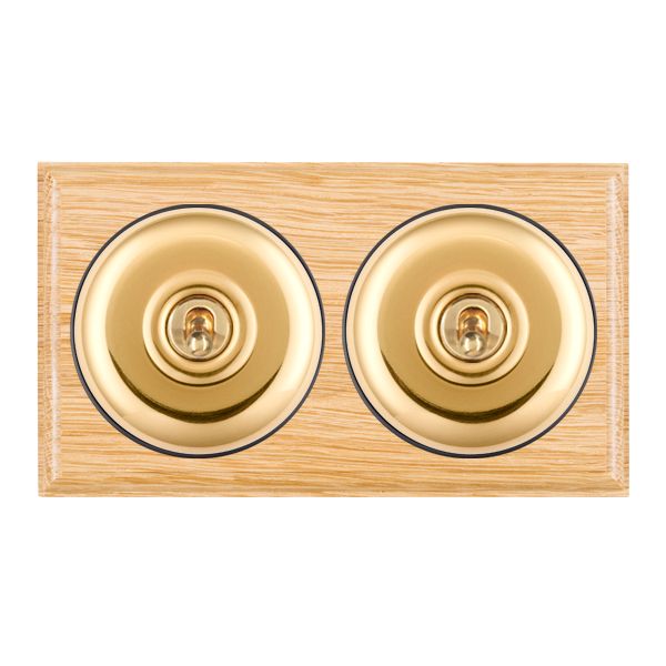 Bloomsbury Ovolo Light Oak 2 gang 20AX Intermediate Toggle Polished Brass Plain Dome/Black Collar