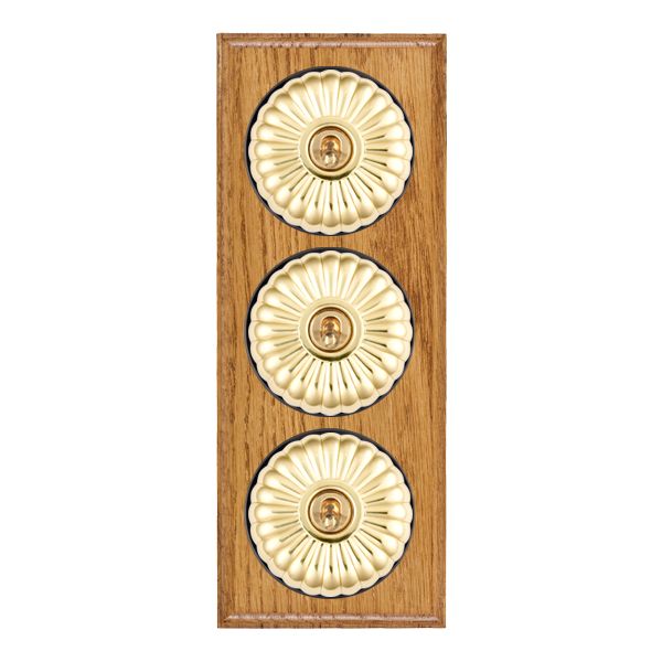 Bloomsbury Ovolo Medium Oak 3 gang 20AX 2 Way Toggle Polished Brass Fluted Dome/Black Collar