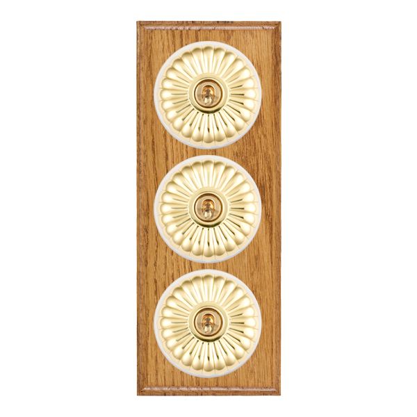 Bloomsbury Ovolo Medium Oak 3 gang 20AX 2 Way Toggle Polished Brass Fluted Dome/White Collar