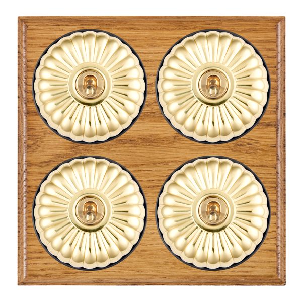 Bloomsbury Ovolo Medium Oak 4 gang 20AX 2 Way Toggle Polished Brass Fluted Dome/Black Collar