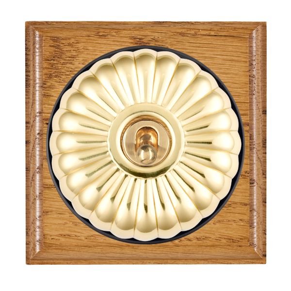 Bloomsbury Ovolo Medium Oak 1 gang 20AX Double Pole Toggle Polished Brass Fluted Dome/Black Collar