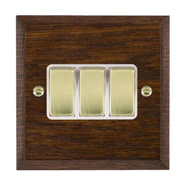 Woods Chamfered Dark Oak 3 gang 10AX 2 Way Rocker Polished Brass/White