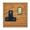 Woods Chamfered Medium Oak 1 gang 13A Double Pole Switched Socket Polished Brass/Black