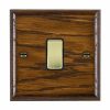 Woods Ovolo Dark Oak 1 gang 10AX Intermediate Rocker Polished Brass/Black