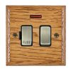 Woods Ovolo Medium Oak 1 gang 13A Double Pole Fused Spur and Neon Antique Brass/Black